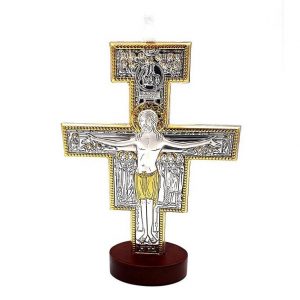 Crist de sant Damià de plata amb base de fusta, tons daurats