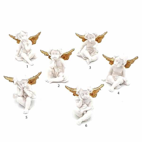 figuras angeles blancos con alas doradas tienen diferentes posiciones