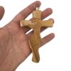 cruz amistad madera mano