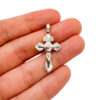 cruz perdon plata relieve mano