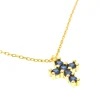 detalle cruz circonitas azules oro