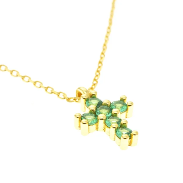 detalle cruz circonitas verdes oro