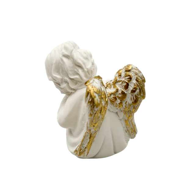 figura angel blanco dormido detras