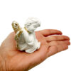 figura angel dormido mano