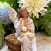 figura angel de la guarda arrullos en jardin