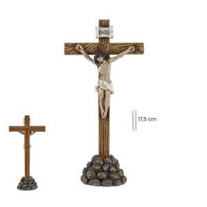 figura jesus crucificado sobre piedras