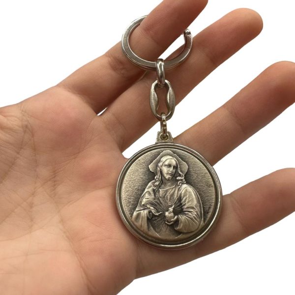 sagrado corazon de jesus mano