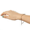 pulsera cuentas negras cruz